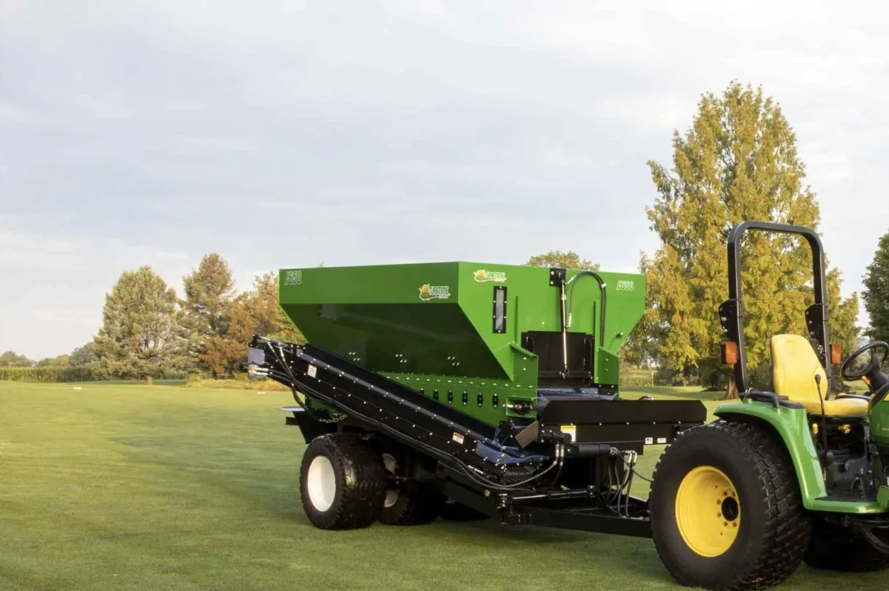 Turf Time FX650 material handler and spreader on a golf course