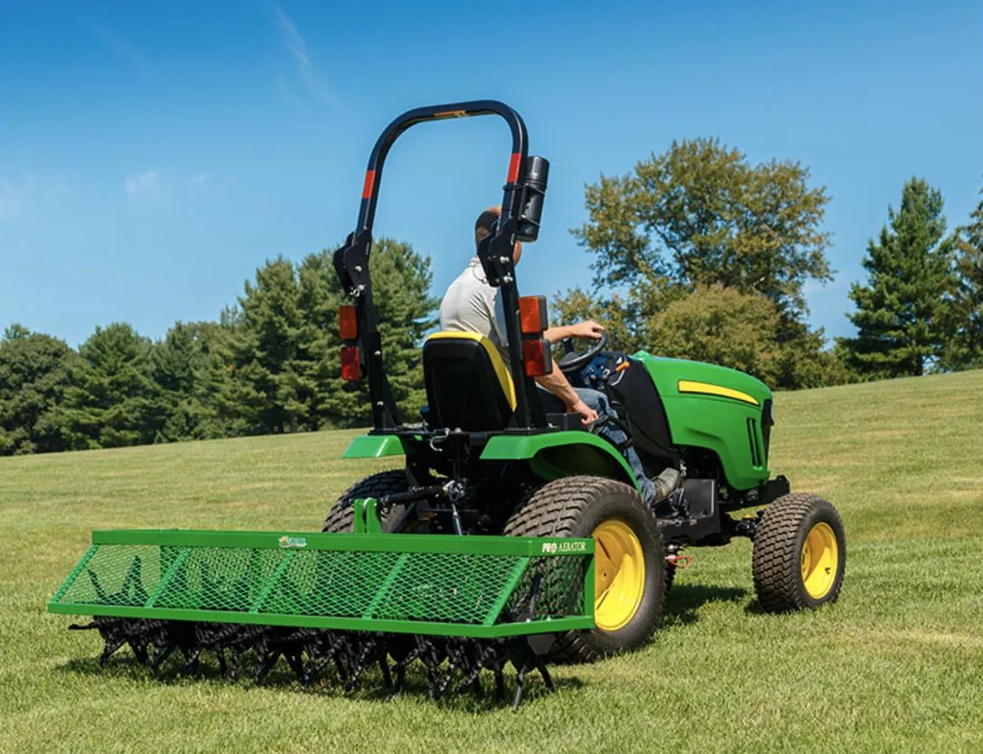Turf Time Pro Series aerator on a compact tractor's 3-point hitch